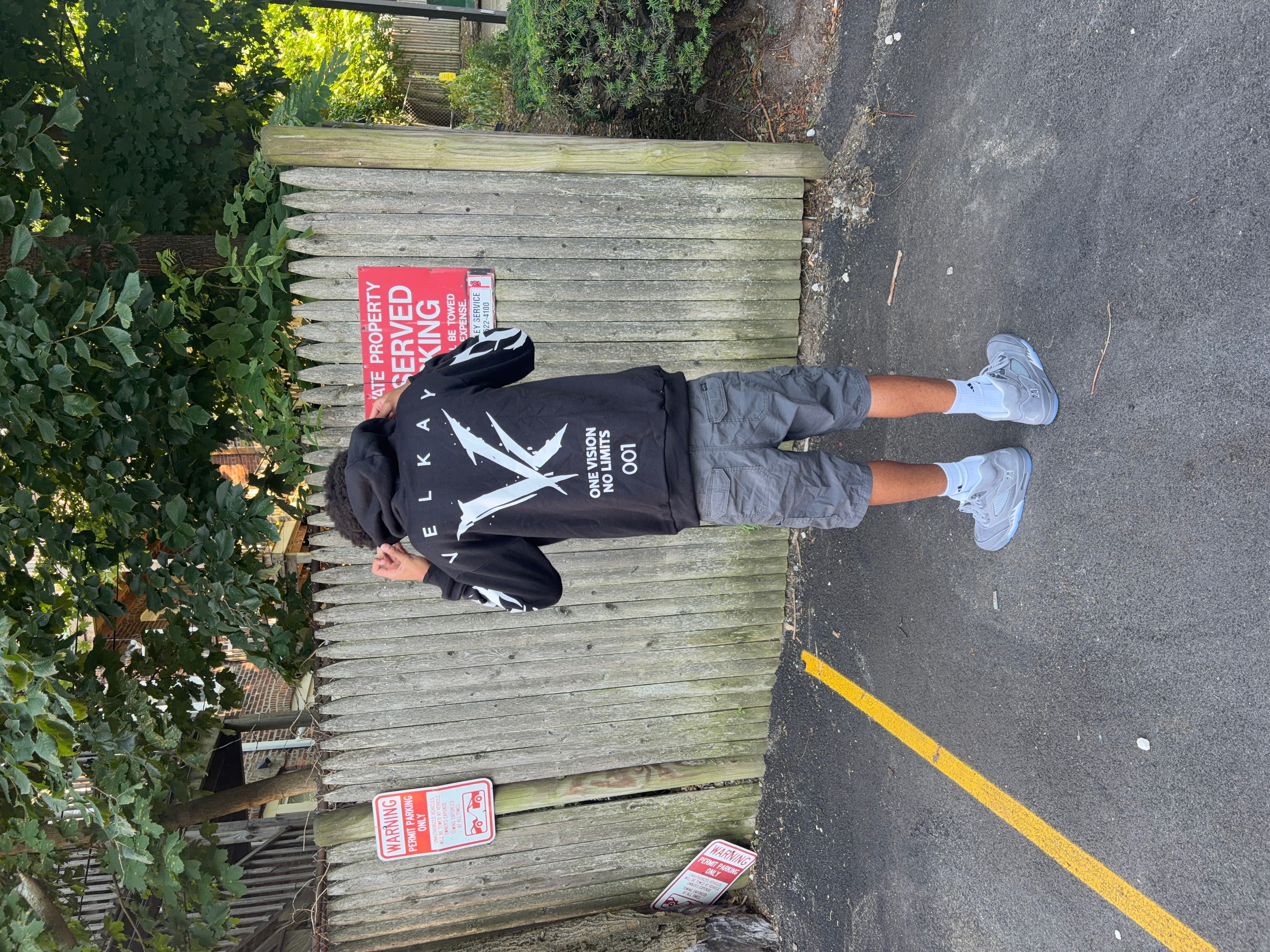Back view of a model wearing the VELKAY Imagination Zip Up