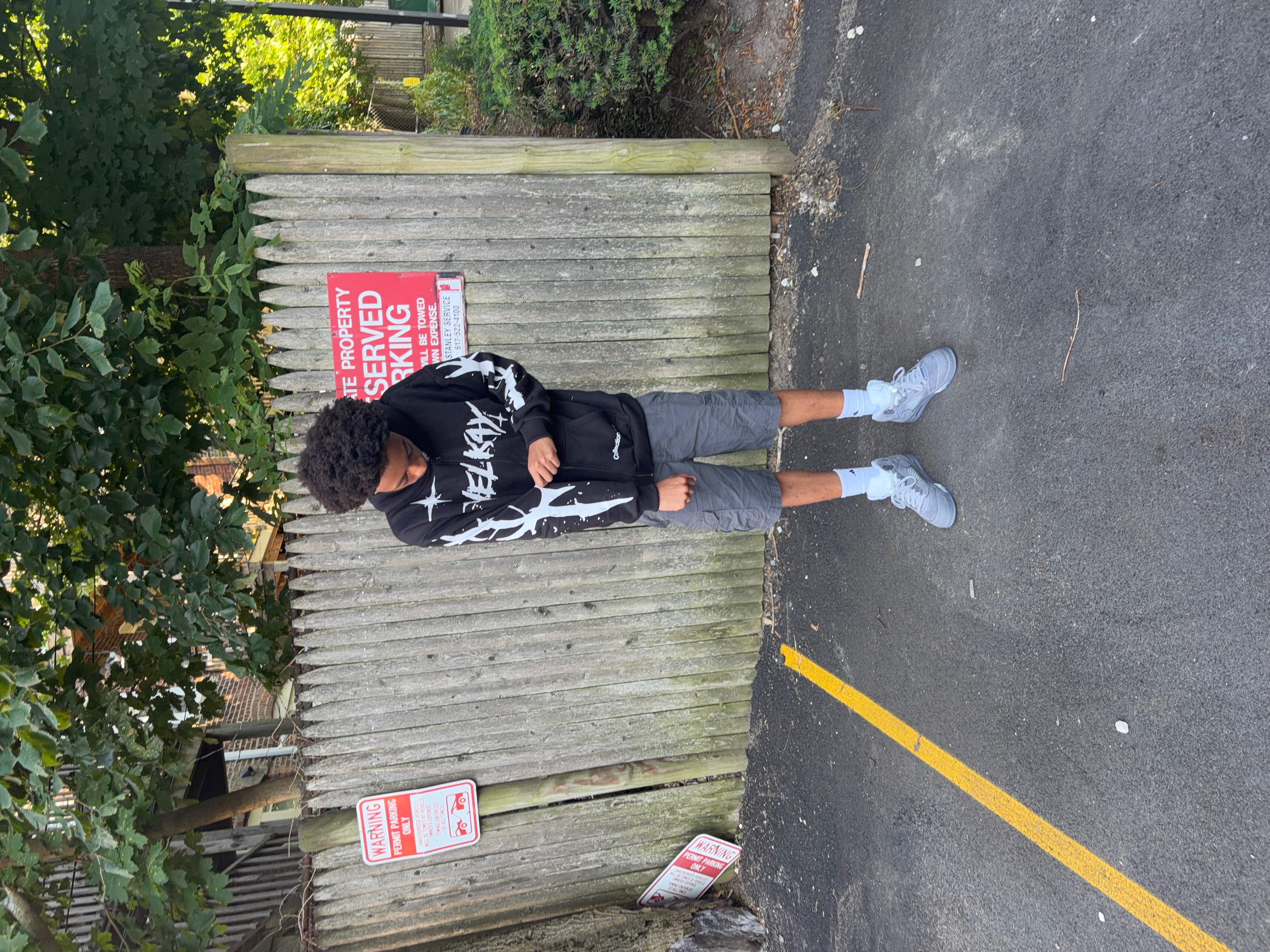 Front view of a model wearing the VELKAY Imagination Zip Up